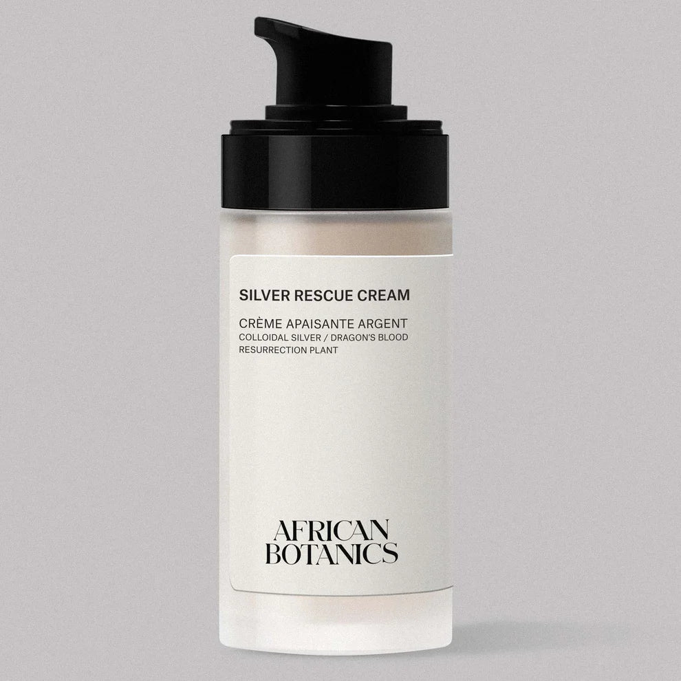 African Botanics Silver Rescue Cream with its screw-on top removed, revealing a black pump.