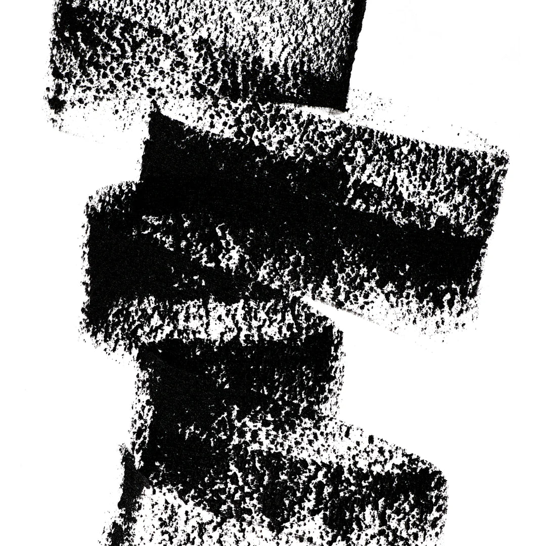 A scribble of Manasi 7 Lip and Eye Definer Petunia drawn on a table showing the smooth texture and charcoal black color.