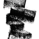 A scribble of Manasi 7 Lip and Eye Definer Petunia drawn on a table showing the smooth texture and charcoal black color.