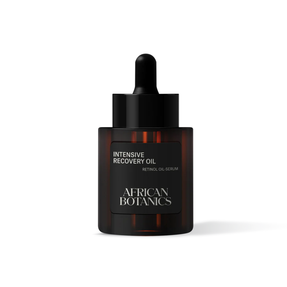 African Botanics Intensive Recovery Oil is in a brown glass bottle with a black label and a screw-on eyedropper cap.