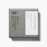 Manasi 7 All Over Colour Rojizo comes in a rectangular grey cardboard package with a white label and black embossed branding.