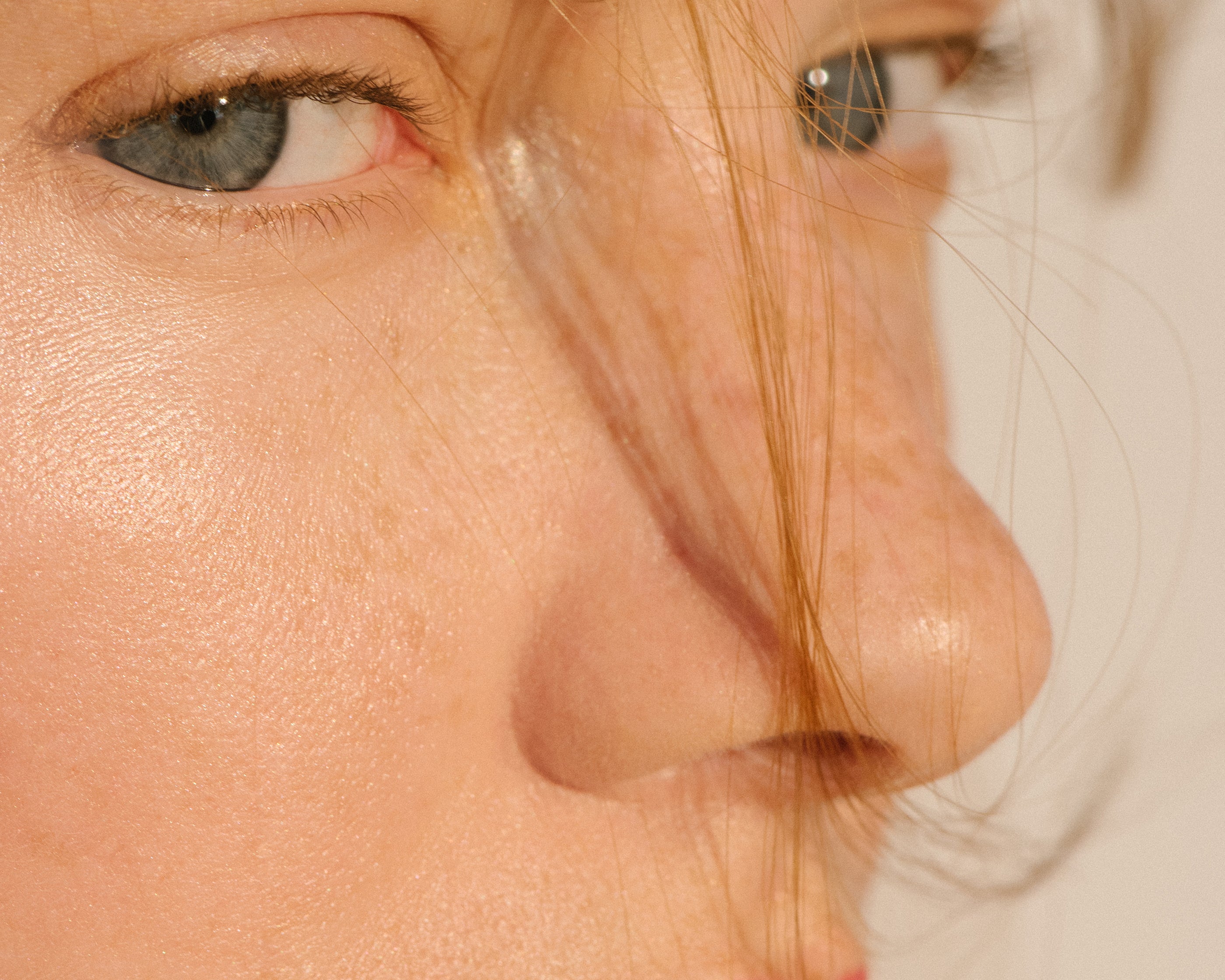 Close-up of Manasi 7 All Over Colour Alizarin on a woman with light complexion's lips, cheeks, and eyes.