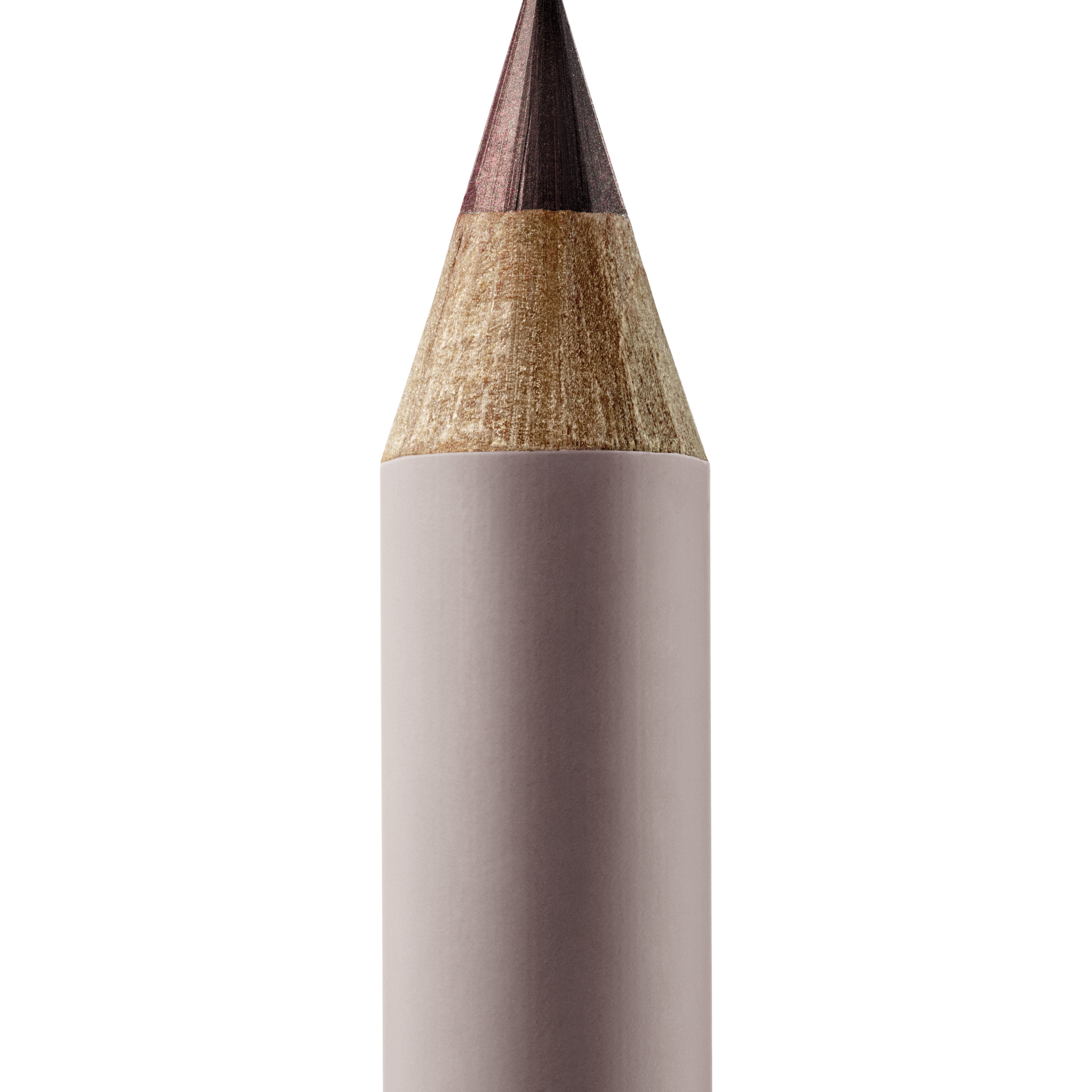 A sharpened Manasi 7 Eye and Lip Definer Nocturne pencil showing the bronze-brown color. The pencil itself is dark pink.
