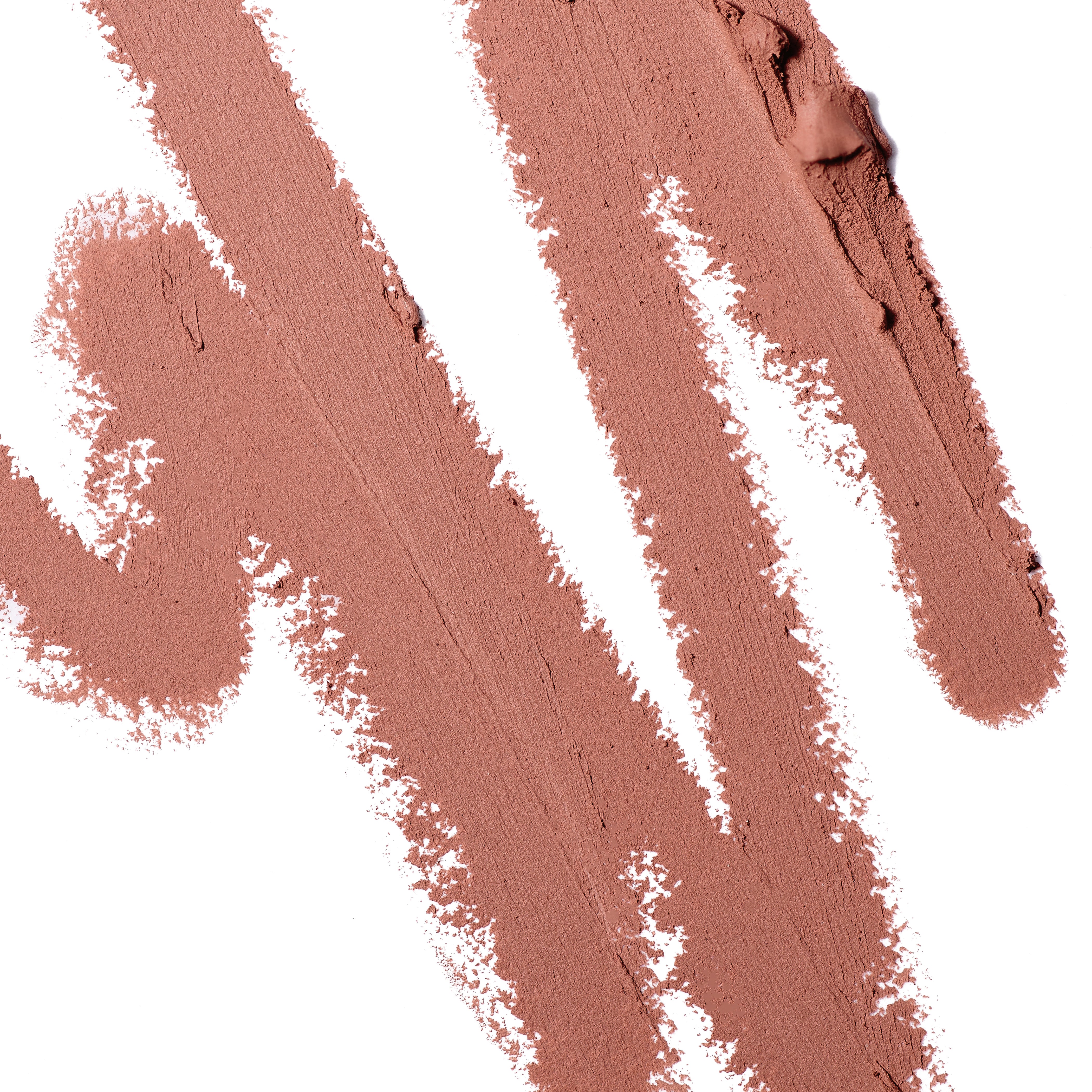A close-up scribble of Manasi 7 Eye and Lip Definer Ukiyo drawn on a table showing the smooth texture and warm natural color.
