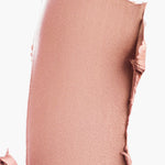 A swatch of Manasi 7 Strobelighter Delirio Radiant Finish showing the creamy texture and rose gold hue.