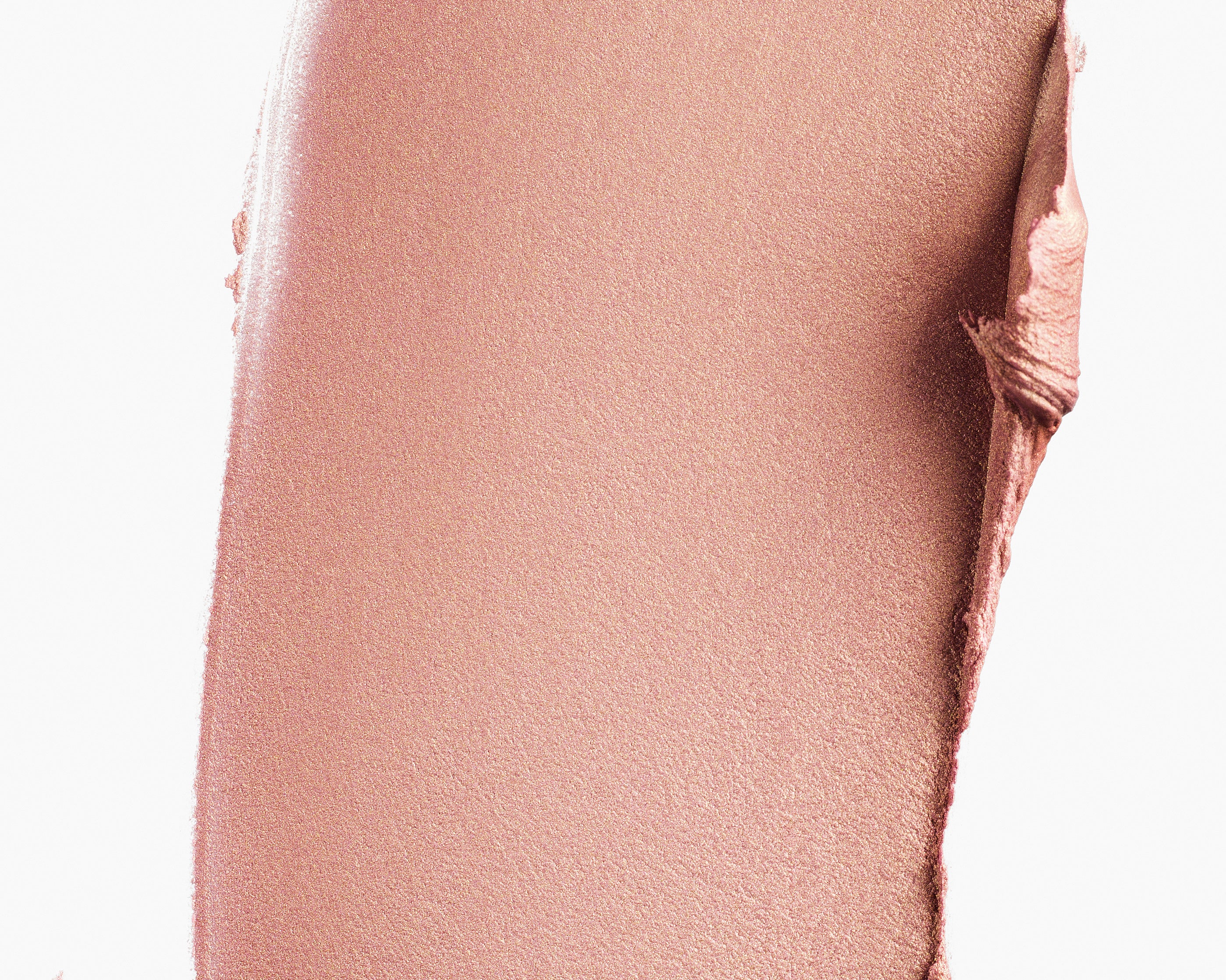 A swatch of Manasi 7 Strobelighter Delirio Radiant Finish showing the creamy texture and rose gold hue.