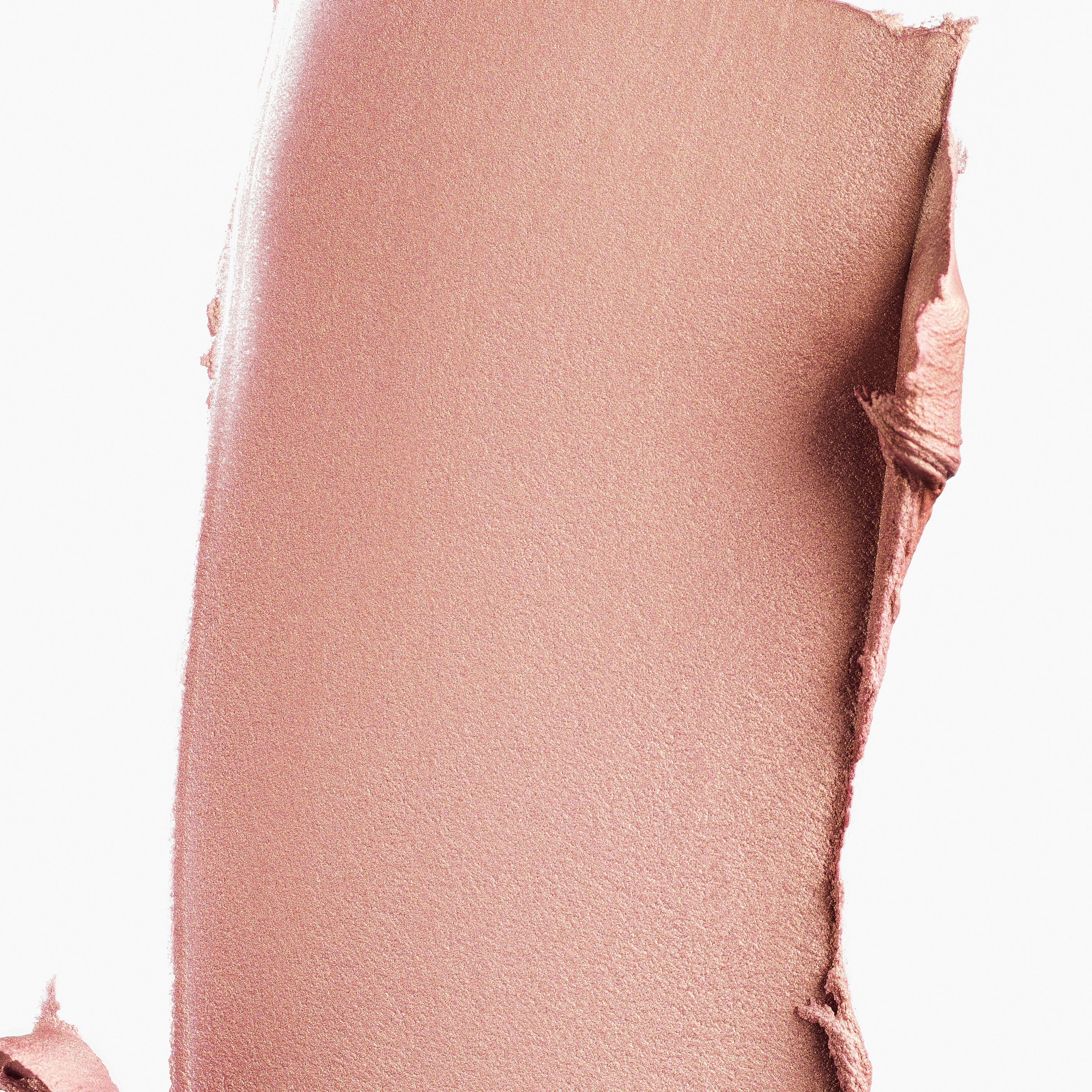 A swatch of Manasi 7 Strobelighter Delirio Radiant Finish showing the creamy texture and rose gold hue.