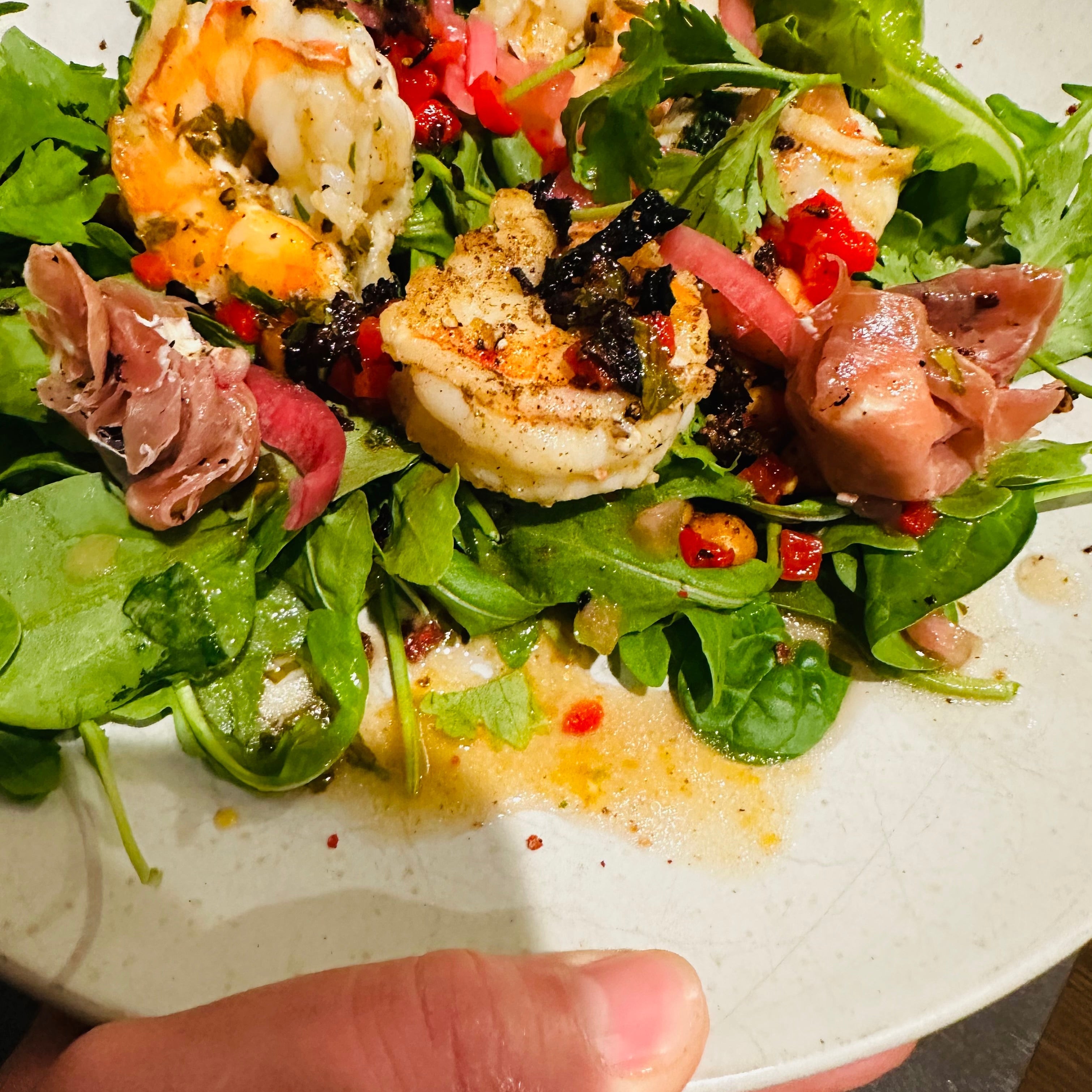 
  
  Salad with prosciutto wrapped goat cheese and shallots 
  
