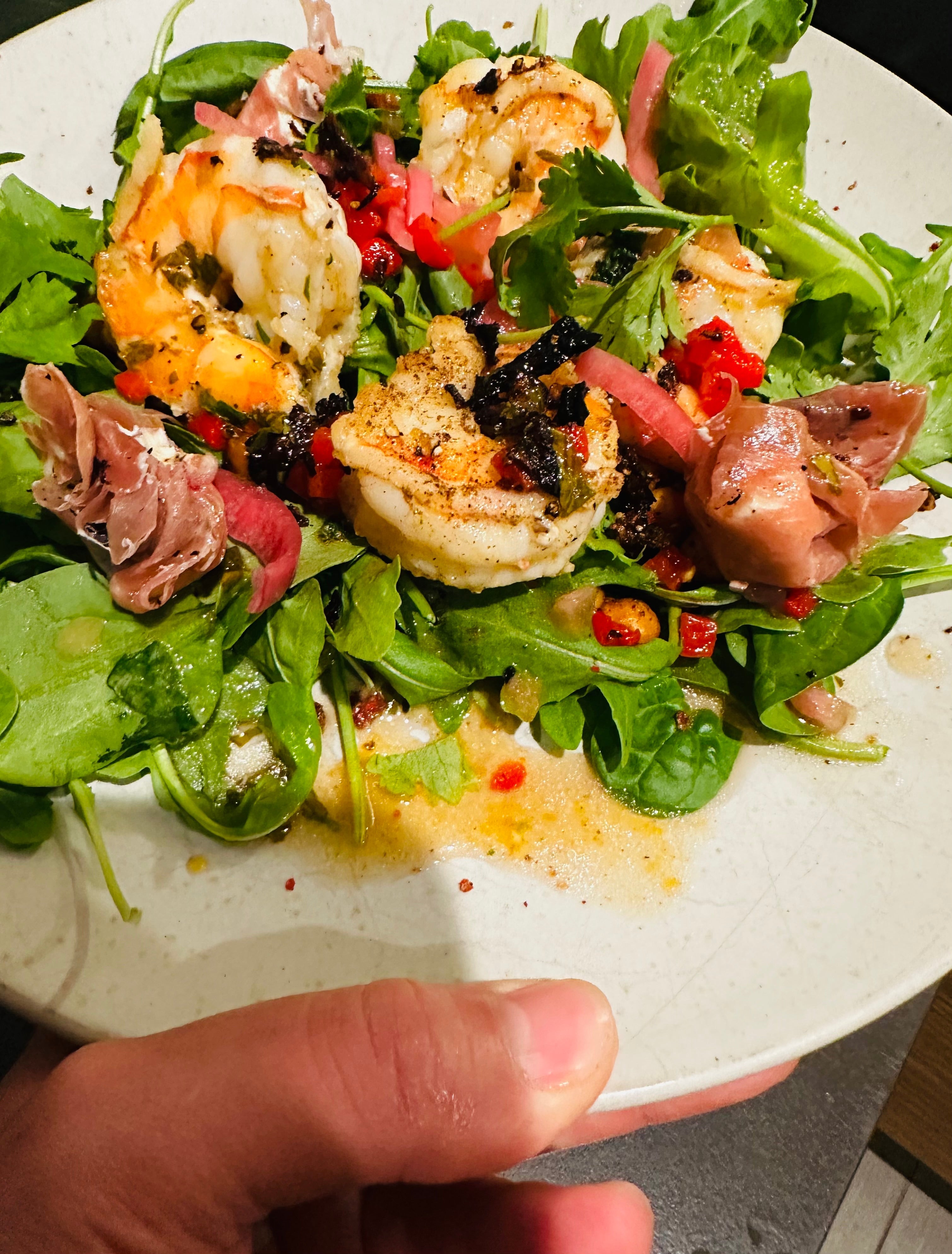 Salad with prosciutto wrapped goat cheese and shallots 