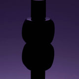 
  
  Black Osmé Fragrance Obsidian abstract  on a purple gradient background
  
