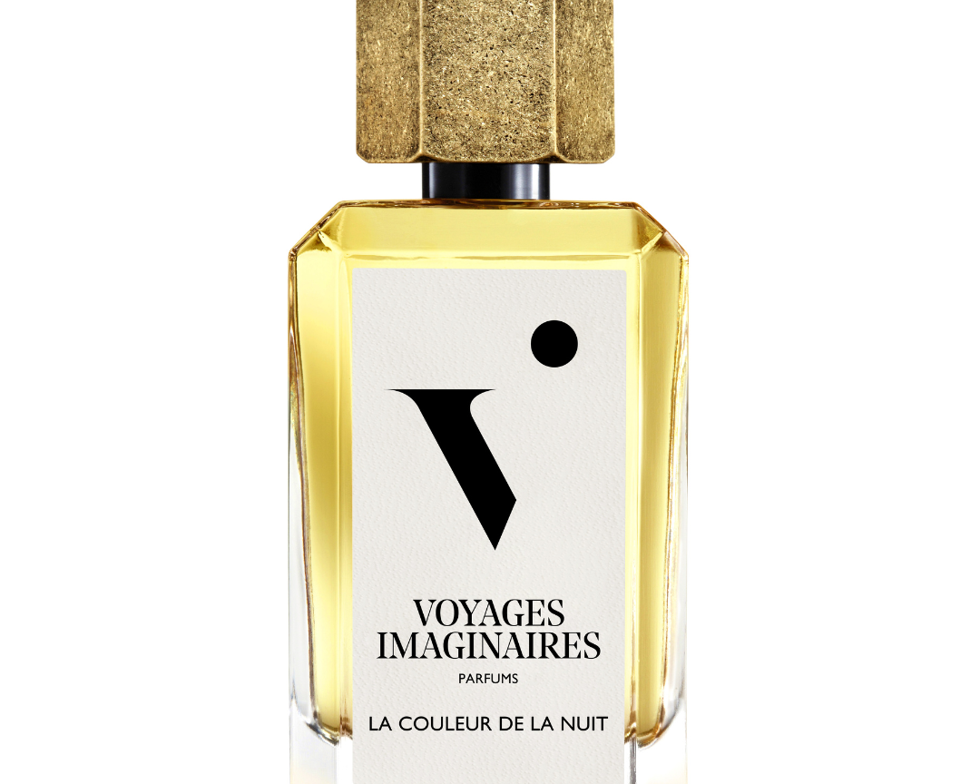 
  
  La Couleur De La Nuit perfume in a geometric glass bottle with white logo sticker and textured gold magnetic cap.
  
