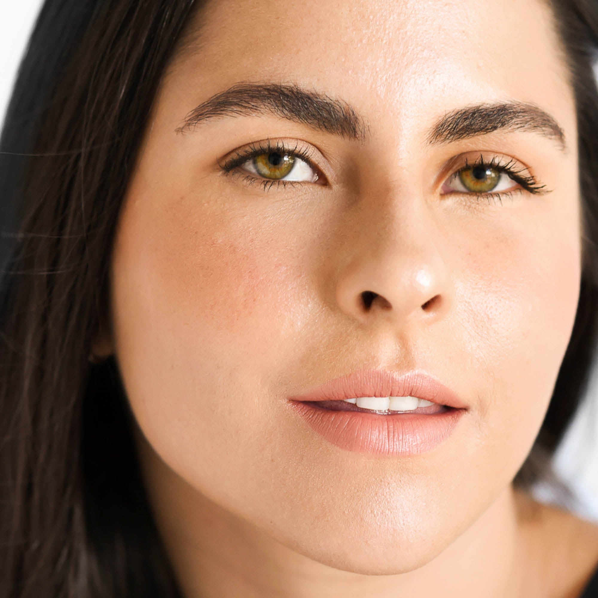 
  
  Oatmilk Foundation Finish medium to golden undertones on woman's face.
  
