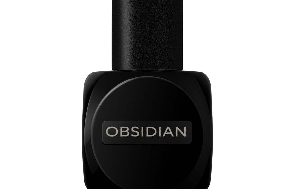 
  
  Black Osmé Fragrance OBSIDIAN perfume bottle on a white background
  
