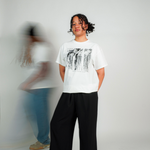 
  
  Person wearing LORDE Beauty Power Love Artist Designed Graphic T-Shirt
  
