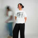 
  
  Person wearing LORDE Beauty Power Love Artist Designed Graphic T-Shirt
  
