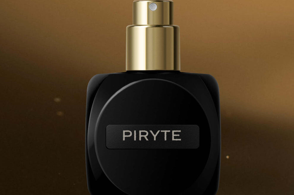 
  
  Osmé Fragrance PIRYTE Black and gold perfume bottle labeled 'PIRYTE' on a brown background
  
