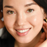 
  
  Ere Perez Oat Milk Foundation Malt on a woman with light complexion and neutral undertones.
  
