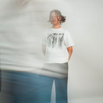 
  
  Person wearing LORDE Beauty Power Love Artist Designed Graphic T-Shirt
  
