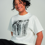 
  
  Person wearing LORDE Beauty Power Love Artist Designed Graphic T-Shirt
  
