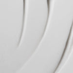 
  
  A swatch of the Omorovicza Balancing Moisturizer shows its thick, light consistency and white color.
  
