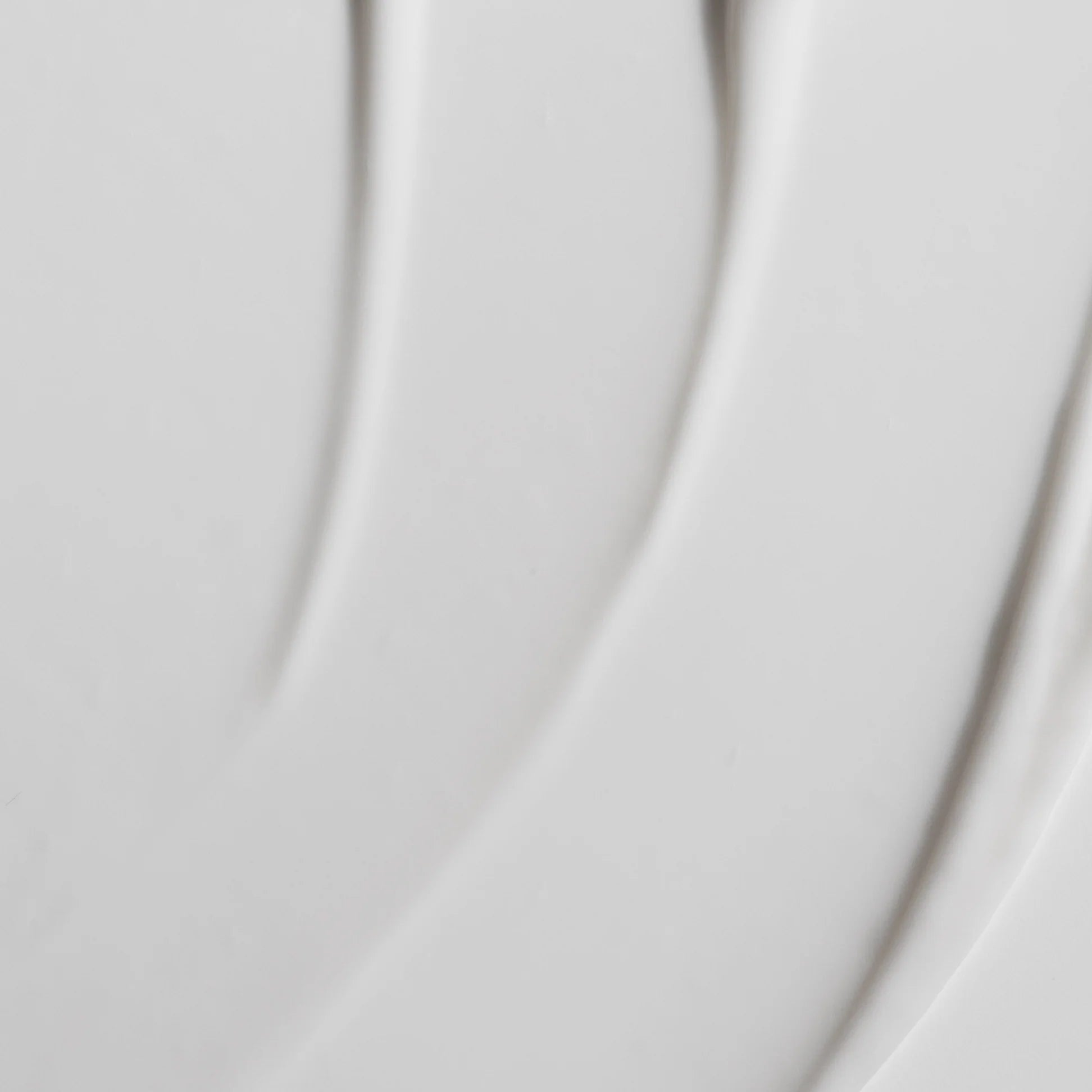 
  
  A swatch of the Omorovicza Balancing Moisturizer shows its thick, light consistency and white color.
  
