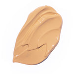 
  
  A creamy swatch of Ere Perez Oat Milk Foundation Brew,  suited for medium skin tones.
  
