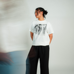 
  
  Person wearing LORDE Beauty Power Love Artist Designed Graphic T-Shirt
  
