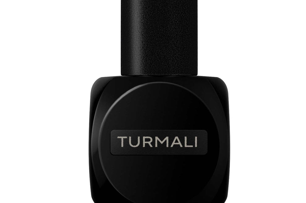 
  
  Black Osmé Fragrance TURMALI perfume bottle on a white background
  
