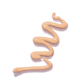 
  
  A swatch of Ere Perez Lychee Creme Corrector Tres, suited for light skin tones.
  
