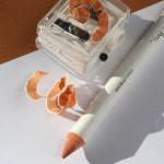 
  
  Ere Perez Perfect Catch Duo Sharpener displaying a freshly sharpened Ere Perez Coco Crayon.
  
