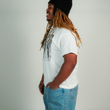 
  
  Person wearing LORDE Beauty Power Love Artist Designed Graphic T-Shirt
  
