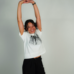 
  
  Person wearing LORDE Beauty Power Love Artist Designed Graphic T-Shirt
  
