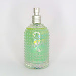 
  
  Textured glass bottle of Cult + King SETSPRAY with an atomizer top.
  
