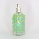 
  
  Textured glass bottle of Cult + King SETSPRAY with an atomizer top.
  
