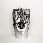
  
  Cult + King CREAMPOP Refill pouch with a silver and black swirl-pattern and a small white screw-on cap.
  
