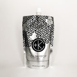
  
  Cult + King CREAMPOP Refill pouch with a silver and black swirl-pattern and a small white screw-on cap.
  
