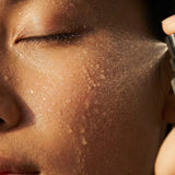 
  
  Close up of Le Prunier Plum Spritz on complexion
  
