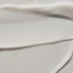 
  
  Close-up of the Omorovicza Reviving Eye Cream showing its rich, creamy consistency and a white color.
  
