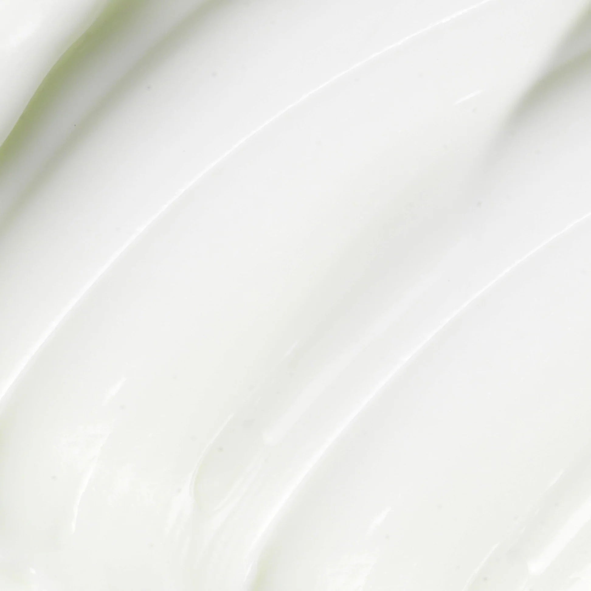 
  
  Close-up of the Omorovicza Blue Diamond Super Cream shows the rich creamy consistency with a white color and slight blue hue.
  
