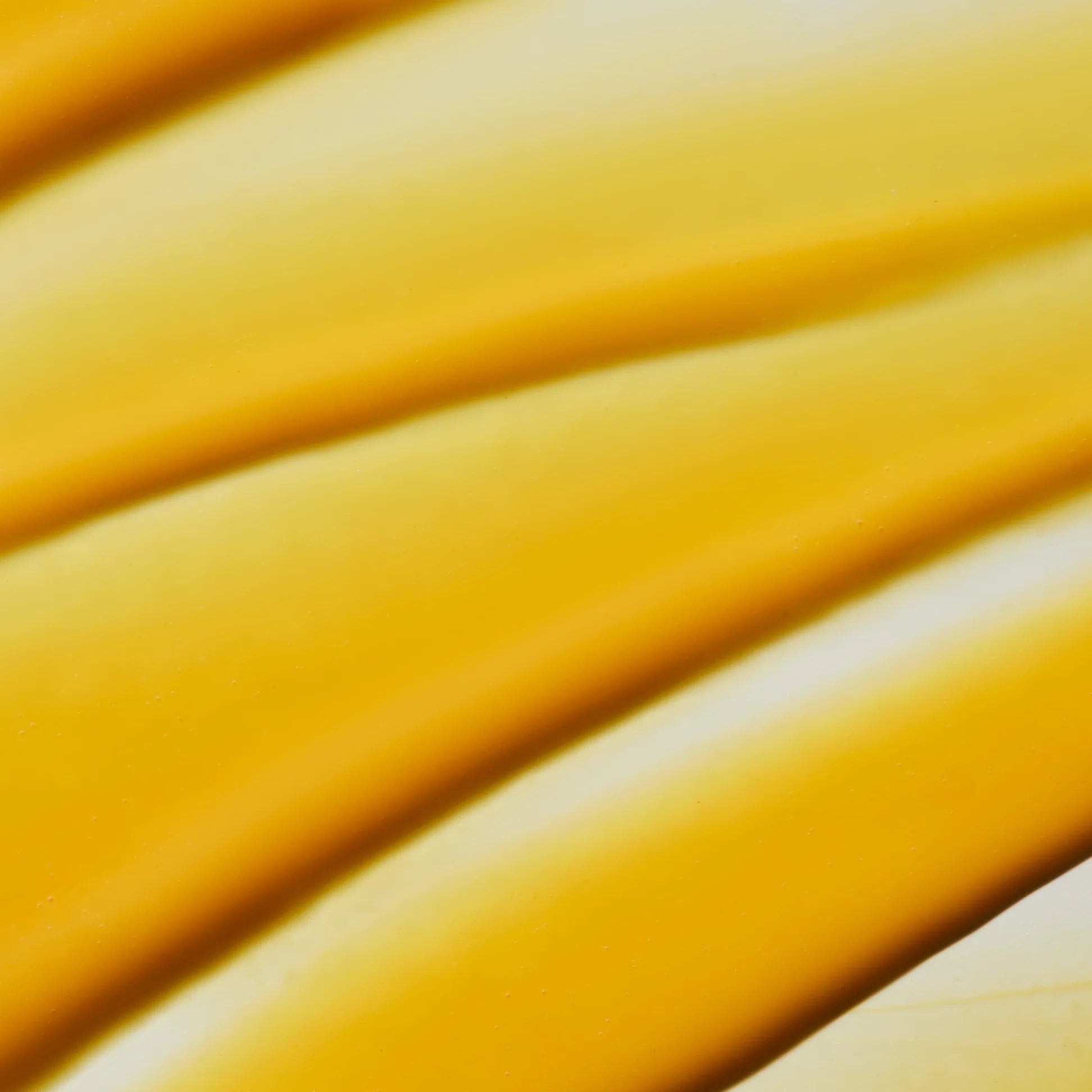 
  
  A close-up photo shows Omorovicza Midnight Renewal Serum's saturated yellow-orange color and rich consistency.
  
