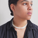 
  
  Person applying Ere Perez Moringa All Beauty Crème before makeup as a primer.
  
