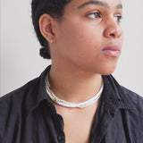 
  
  Person applying Ere Perez Moringa All Beauty Crème before makeup as a primer.
  
