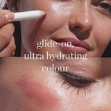 
  
  Person applying Ere Perez Coco Crayon to face.
  
