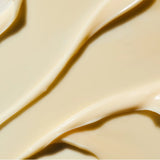 
  
  Close-up of the Omorovicza Rejuvenating Night Cream showing its soft yellow color and velvety consistency.
  
